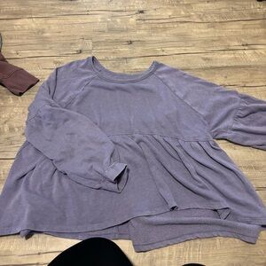 Long sleeve peplum top.